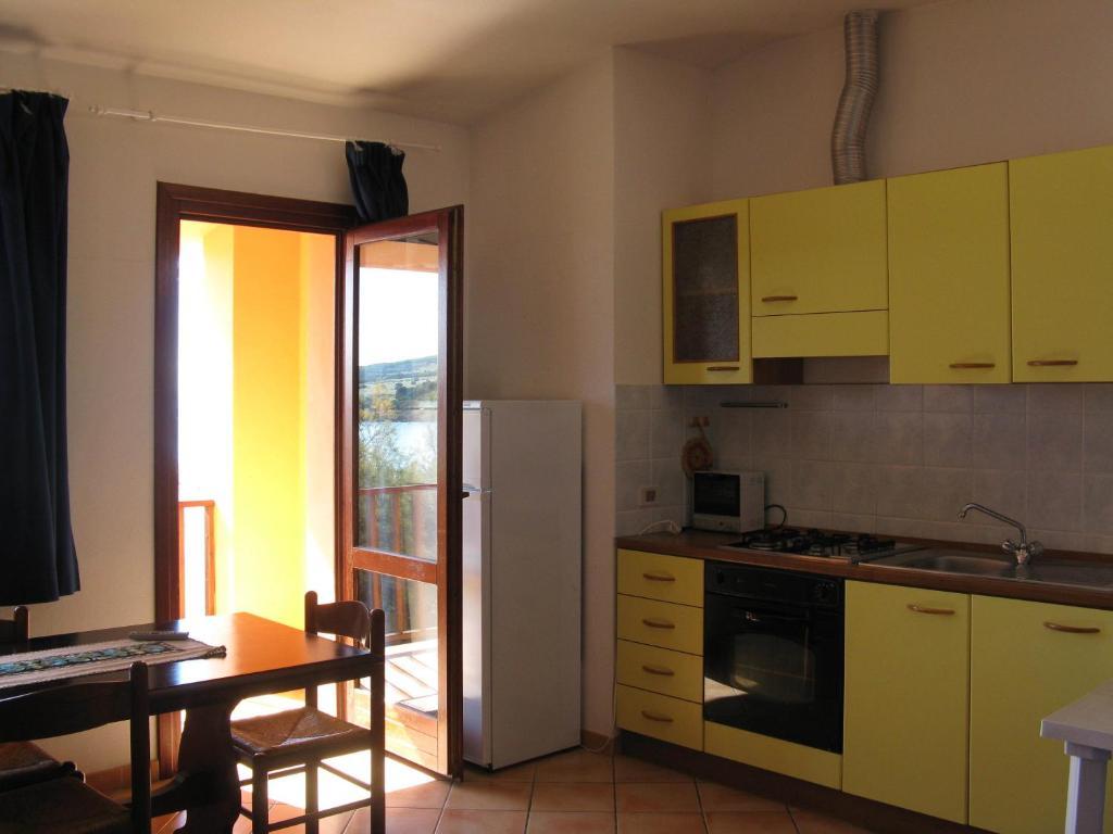 Borgo Spiaggia Vista Mare Isola Rossa Room photo